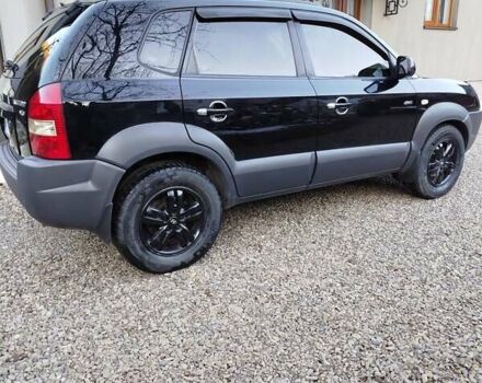 Черный Хендай Туксон, объемом двигателя 2.7 л и пробегом 290 тыс. км за 7300 $, фото 2 на Automoto.ua