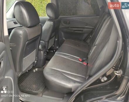 Черный Хендай Туксон, объемом двигателя 2 л и пробегом 237 тыс. км за 7999 $, фото 31 на Automoto.ua