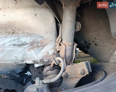 Черный Хендай Туксон, объемом двигателя 2.7 л и пробегом 275 тыс. км за 5500 $, фото 5 на Automoto.ua