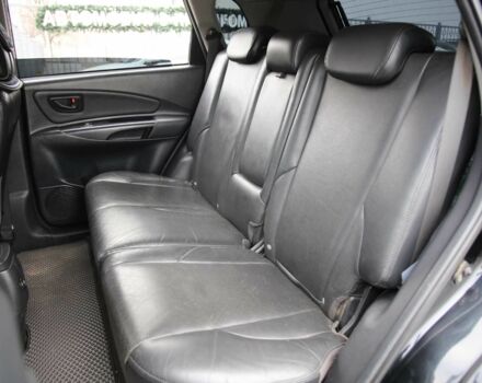 Черный Хендай Туксон, объемом двигателя 2.7 л и пробегом 217 тыс. км за 8600 $, фото 7 на Automoto.ua