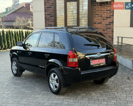Черный Хендай Туксон, объемом двигателя 2 л и пробегом 249 тыс. км за 7450 $, фото 10 на Automoto.ua