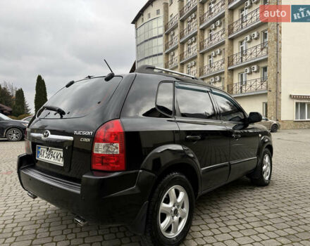 Черный Хендай Туксон, объемом двигателя 1.98 л и пробегом 250 тыс. км за 7150 $, фото 5 на Automoto.ua