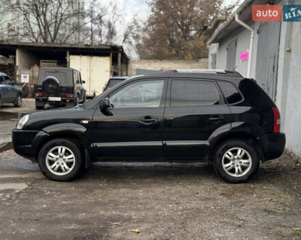 Черный Хендай Туксон, объемом двигателя 1.98 л и пробегом 198 тыс. км за 7500 $, фото 1 на Automoto.ua