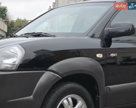 Чорний Хендай Туксон, об'ємом двигуна 1.98 л та пробігом 123 тис. км за 7950 $, фото 13 на Automoto.ua