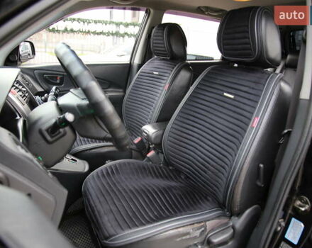 Черный Хендай Туксон, объемом двигателя 2.66 л и пробегом 217 тыс. км за 8600 $, фото 6 на Automoto.ua