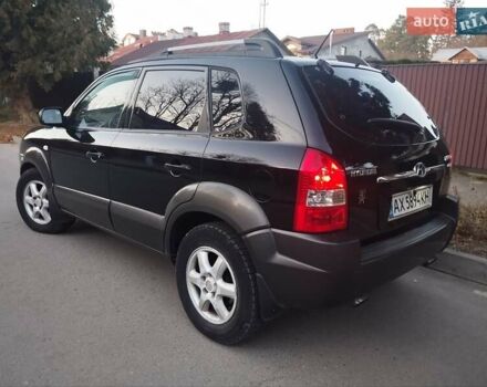 Чорний Хендай Туксон, об'ємом двигуна 1.99 л та пробігом 239 тис. км за 6990 $, фото 12 на Automoto.ua