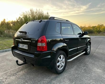 Чорний Хендай Туксон, об'ємом двигуна 2 л та пробігом 235 тис. км за 6700 $, фото 9 на Automoto.ua