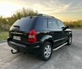 Чорний Хендай Туксон, об'ємом двигуна 2 л та пробігом 235 тис. км за 6700 $, фото 9 на Automoto.ua