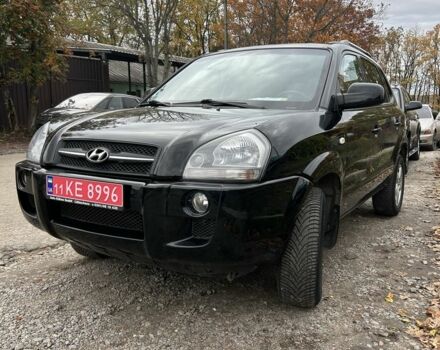 Черный Хендай Туксон, объемом двигателя 2 л и пробегом 159 тыс. км за 8650 $, фото 1 на Automoto.ua