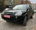 Черный Хендай Туксон, объемом двигателя 2 л и пробегом 159 тыс. км за 8650 $, фото 1 на Automoto.ua