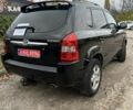 Черный Хендай Туксон, объемом двигателя 2 л и пробегом 159 тыс. км за 8650 $, фото 2 на Automoto.ua