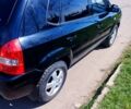 Черный Хендай Туксон, объемом двигателя 2 л и пробегом 295 тыс. км за 7700 $, фото 8 на Automoto.ua