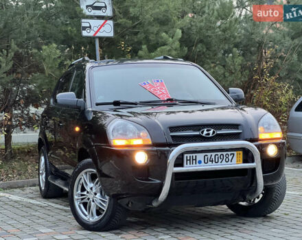Чорний Хендай Туксон, об'ємом двигуна 1.98 л та пробігом 170 тис. км за 6999 $, фото 1 на Automoto.ua