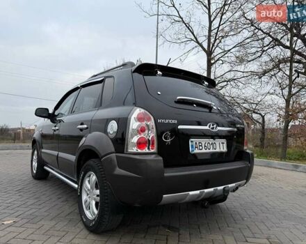 Чорний Хендай Туксон, об'ємом двигуна 2 л та пробігом 124 тис. км за 7950 $, фото 18 на Automoto.ua