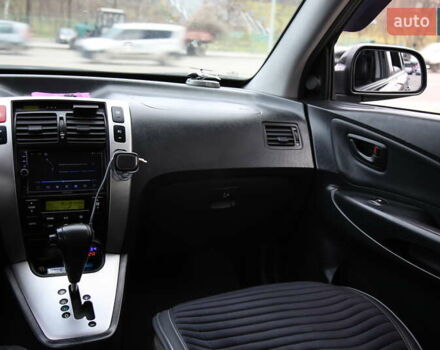 Черный Хендай Туксон, объемом двигателя 2.66 л и пробегом 217 тыс. км за 8600 $, фото 12 на Automoto.ua