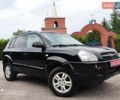 Черный Хендай Туксон, объемом двигателя 2 л и пробегом 249 тыс. км за 8300 $, фото 1 на Automoto.ua