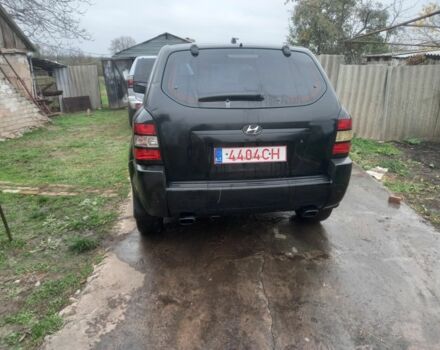 Черный Хендай Туксон, объемом двигателя 2 л и пробегом 395 тыс. км за 4500 $, фото 2 на Automoto.ua