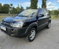Черный Хендай Туксон, объемом двигателя 2 л и пробегом 249 тыс. км за 5800 $, фото 1 на Automoto.ua