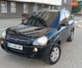 Чорний Хендай Туксон, об'ємом двигуна 2 л та пробігом 141 тис. км за 7999 $, фото 1 на Automoto.ua