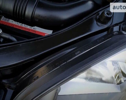 Черный Хендай Туксон, объемом двигателя 2 л и пробегом 170 тыс. км за 8700 $, фото 175 на Automoto.ua