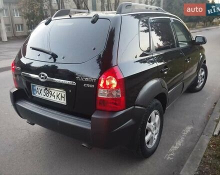 Чорний Хендай Туксон, об'ємом двигуна 1.99 л та пробігом 239 тис. км за 6990 $, фото 9 на Automoto.ua