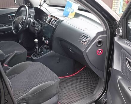 Черный Хендай Туксон, объемом двигателя 2 л и пробегом 124 тыс. км за 7200 $, фото 4 на Automoto.ua