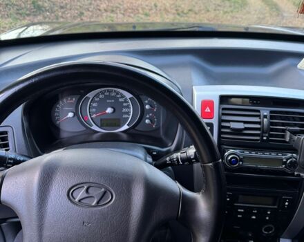 Черный Хендай Туксон, объемом двигателя 2 л и пробегом 210 тыс. км за 7200 $, фото 9 на Automoto.ua