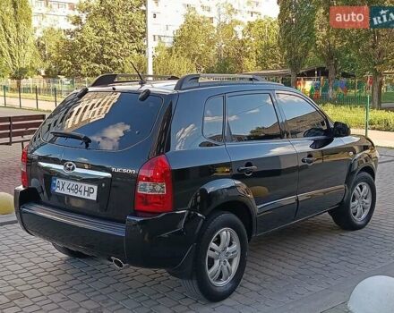 Чорний Хендай Туксон, об'ємом двигуна 2 л та пробігом 141 тис. км за 7999 $, фото 23 на Automoto.ua