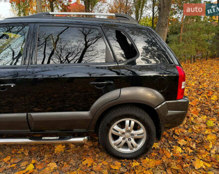 Черный Хендай Туксон, объемом двигателя 2 л и пробегом 210 тыс. км за 7990 $, фото 9 на Automoto.ua