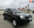 Черный Хендай Туксон, объемом двигателя 1.98 л и пробегом 250 тыс. км за 7150 $, фото 2 на Automoto.ua