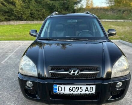 Чорний Хендай Туксон, об'ємом двигуна 2 л та пробігом 235 тис. км за 6700 $, фото 4 на Automoto.ua