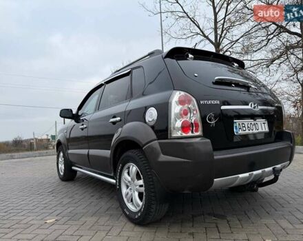 Чорний Хендай Туксон, об'ємом двигуна 2 л та пробігом 124 тис. км за 7950 $, фото 14 на Automoto.ua