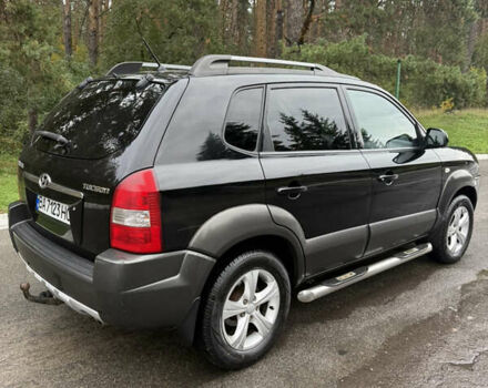 Черный Хендай Туксон, объемом двигателя 2 л и пробегом 209 тыс. км за 7800 $, фото 9 на Automoto.ua