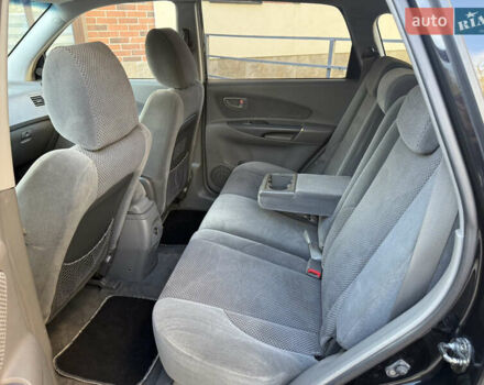 Черный Хендай Туксон, объемом двигателя 2 л и пробегом 249 тыс. км за 7450 $, фото 25 на Automoto.ua