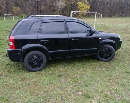 Чорний Хендай Туксон, об'ємом двигуна 2 л та пробігом 220 тис. км за 8300 $, фото 2 на Automoto.ua