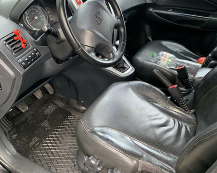 Черный Хендай Туксон, объемом двигателя 1.99 л и пробегом 290 тыс. км за 7700 $, фото 22 на Automoto.ua