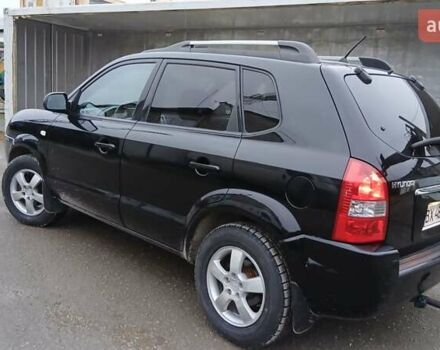 Чорний Хендай Туксон, об'ємом двигуна 1.98 л та пробігом 320 тис. км за 6500 $, фото 3 на Automoto.ua