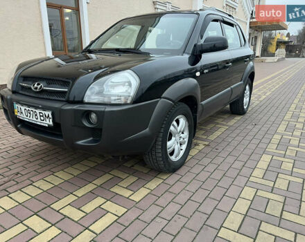 Черный Хендай Туксон, объемом двигателя 1.98 л и пробегом 227 тыс. км за 6900 $, фото 5 на Automoto.ua