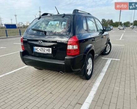 Чорний Хендай Туксон, об'ємом двигуна 2 л та пробігом 277 тис. км за 6000 $, фото 6 на Automoto.ua