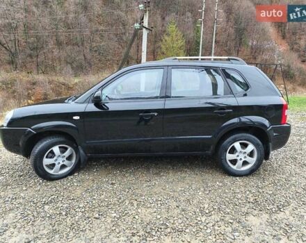 Чорний Хендай Туксон, об'ємом двигуна 2 л та пробігом 271 тис. км за 6599 $, фото 3 на Automoto.ua
