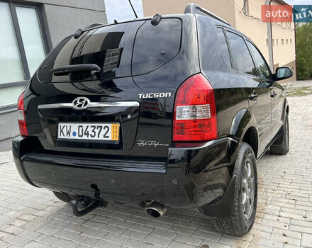 Чорний Хендай Туксон, об'ємом двигуна 2 л та пробігом 144 тис. км за 6599 $, фото 16 на Automoto.ua