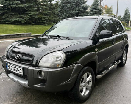 Черный Хендай Туксон, объемом двигателя 2 л и пробегом 209 тыс. км за 7800 $, фото 4 на Automoto.ua