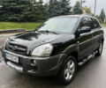 Черный Хендай Туксон, объемом двигателя 2 л и пробегом 209 тыс. км за 7800 $, фото 4 на Automoto.ua