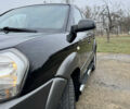 Черный Хендай Туксон, объемом двигателя 2 л и пробегом 201 тыс. км за 7750 $, фото 14 на Automoto.ua