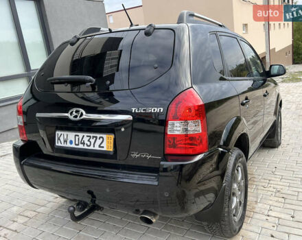 Чорний Хендай Туксон, об'ємом двигуна 2 л та пробігом 144 тис. км за 6599 $, фото 17 на Automoto.ua