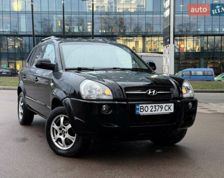 Чорний Хендай Туксон, об'ємом двигуна 1.99 л та пробігом 310 тис. км за 6399 $, фото 6 на Automoto.ua