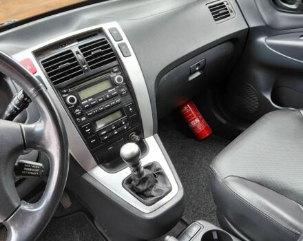 Черный Хендай Туксон, объемом двигателя 2 л и пробегом 233 тыс. км за 7000 $, фото 12 на Automoto.ua