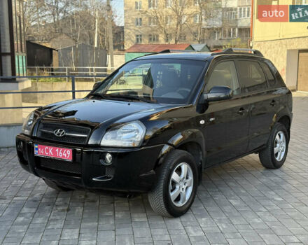 Черный Хендай Туксон, объемом двигателя 2 л и пробегом 249 тыс. км за 7450 $, фото 4 на Automoto.ua
