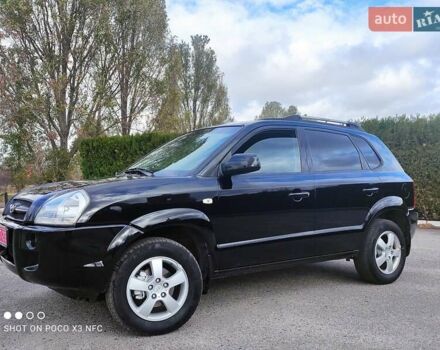Черный Хендай Туксон, объемом двигателя 2 л и пробегом 237 тыс. км за 7999 $, фото 10 на Automoto.ua