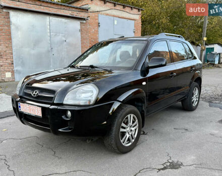 Черный Хендай Туксон, объемом двигателя 2 л и пробегом 189 тыс. км за 7150 $, фото 4 на Automoto.ua